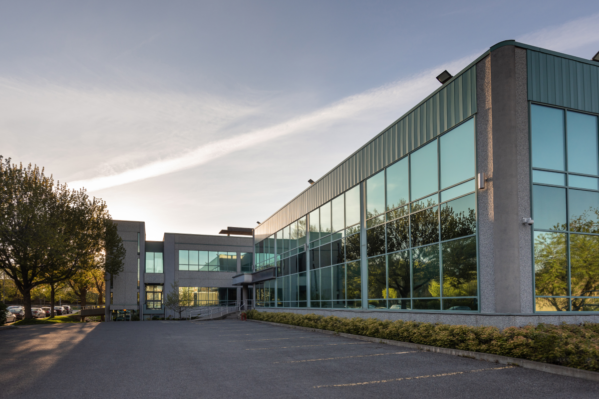 3333 A large building with many windows and trees